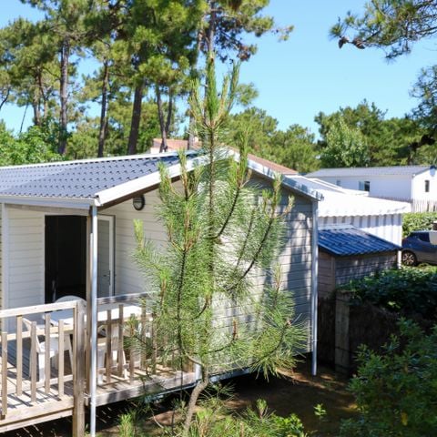 Stacaravan 4 personen - MALAGA 27m² - 2 kamers met halfoverdekt houten terras.