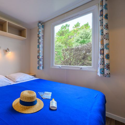 Mobilheim 4 personen - D/ FREIZEIT & KOMFORT 2 Schlafzimmer – 25 m² – Terrasse mit Sonnenschirm für 4 Personen
