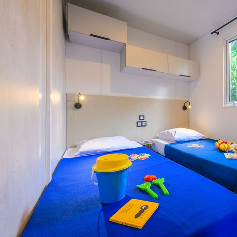 Mobilhome 4 personnes - D/ COTTAGE CONFORT 2 chambres - 30m2 - terrasse couverte 4 pers