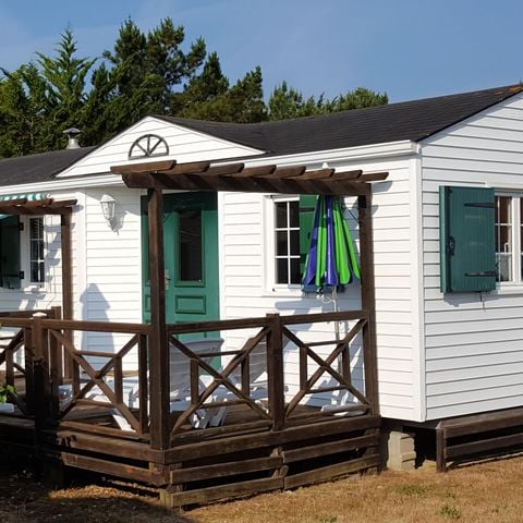 Stacaravan 4 personen - ACAPULCO Ruime 2-slaapkamer stacaravan (voormalig woonhuis) gelegen aan de ingang van de camping + luifel