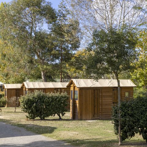 PARCELA - Paquete Premium Freecamp con instalaciones sanitarias privadas + mesa de picnic + cocina + semi-piéton 2/8 pers.