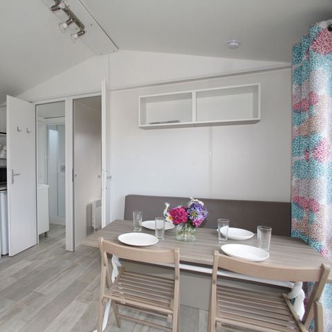 Stacaravan 7 personen - Premium 34m² - 3 kamers - Overdekt terras - TV - vaatwasser - lakens - handdoeken