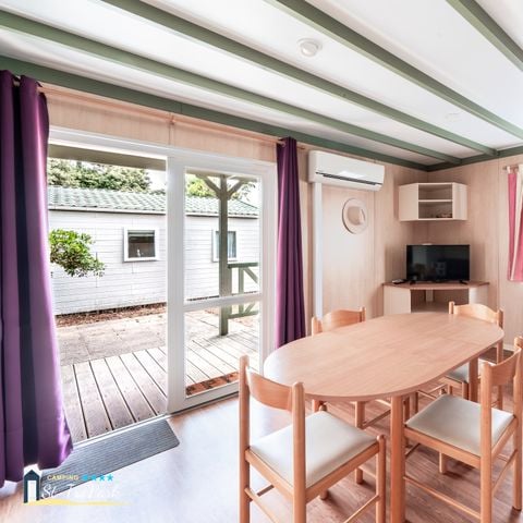 Chalet 4 personnes - Premium 35m² - 2 chambres - Climatisation - Lave-vaisselle - Terrasse couverte 12m²