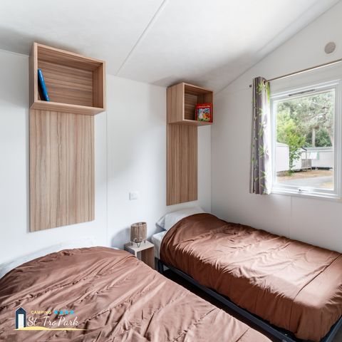 Mobile home 4 persons - Comfort mobile home 27.5m² (2 bedrooms) + 11m² semi-covered wooden terrace