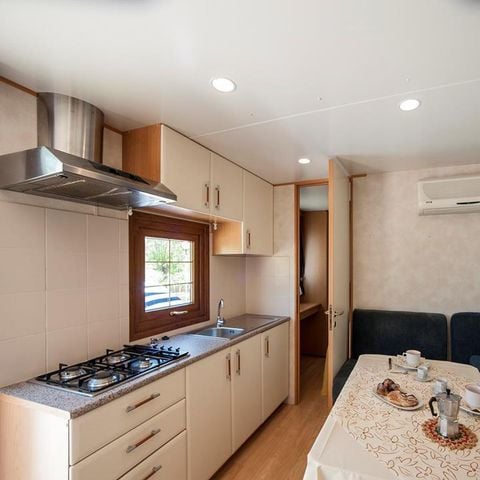 Mobilheim 4 Personen - (2 Personen inbegriffen - 2 weitere Personen gegen Aufpreis möglich, bitte kontaktieren Sie den Campingplatz)