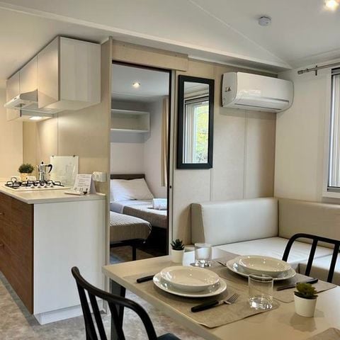 Mobile home 2 persons - (2 persons included - 2 additional persons possible at extra charge, please contact the campsite)