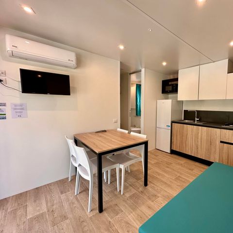 MOBILE HOME 2 people - Premium mobile home with 2 bedrooms - 2 bathrooms (2 persons included - 2 additional persons possible at extra charge, please contact the campsite)
