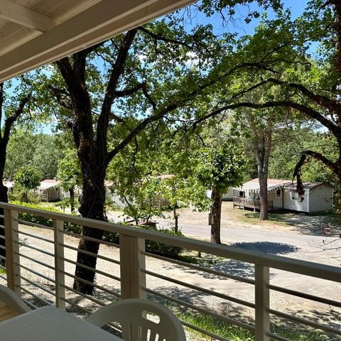 Mobile home 2 persons - Premium mobile home with 2 bedrooms - 2 bathrooms (2 persons included - 2 additional persons possible at extra charge, please contact the campsite)