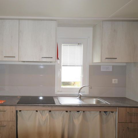 Mobile home 2 persons - Accessible to persons with reduced mobility - 2 persons included - 2 additional - Persons possible with surcharge - Please contact campsite