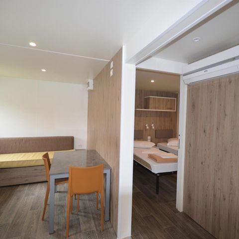 Mobile home 2 persons - Accessible to persons with reduced mobility - 2 persons included - 2 additional - Persons possible with surcharge - Please contact campsite