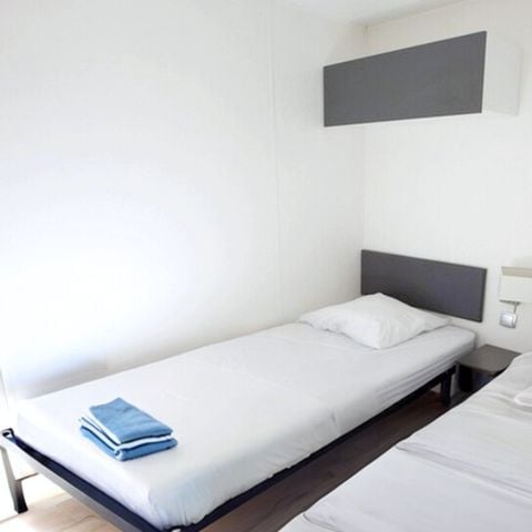 Stacaravan 4 personen - Premium 40m² 2 kamers + CLIM + TV + panoramisch terras + Bedlinnenpakket + handdoeken