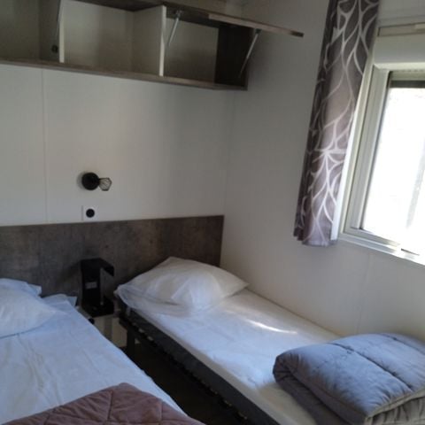 BUNGALOW 4 personnes - Confort 27m² - 2 chambres + Terrasse couverte + Clim réversible + TV