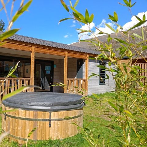 Chalet 4 Personen - SPA Confort 35m² - 2 Zimmer + Überdachte Terrasse + Reversible Klimaanlage + TV