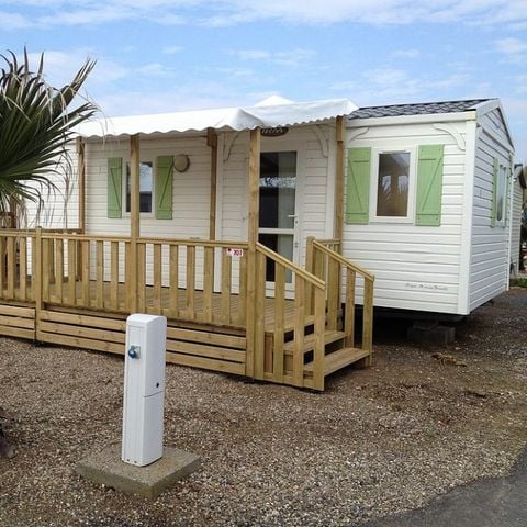 MOBILHOME 2 personnes - 1 chambre bord d'étang, 16m2 catégorie 1