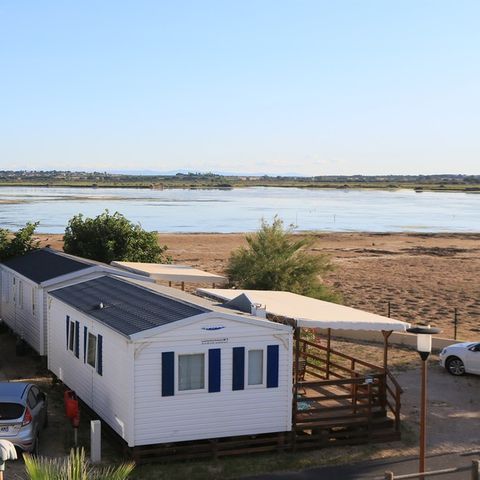 Mobile home 4 persons - 2 rooms on the edge of the lake, 23m2 category 2