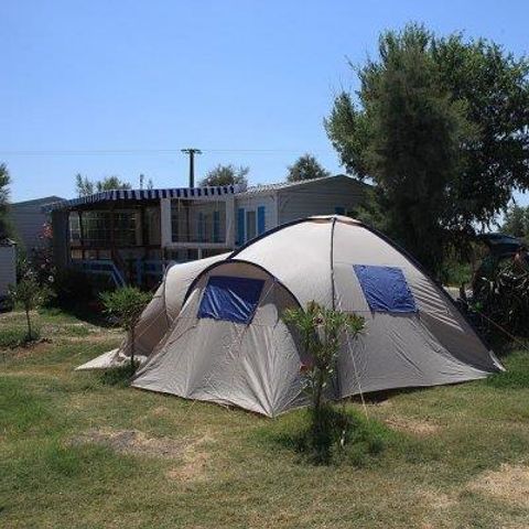 PLOT - Tent or caravan pitch + 1 vehicle + electricity + water