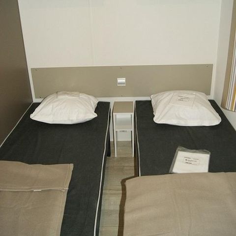 Mobilhome 4 personnes - Cipressino Confort 22m² - 2 chambres - Terrasse semi-couverte - Clim