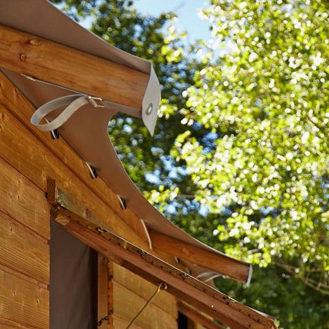 Accommodatie 4 personen - Cabane Lodge Bois sur pilotis Standaard 38m² (2 kamers) inclusief overdekt terras 12m² + TV 4 pers.