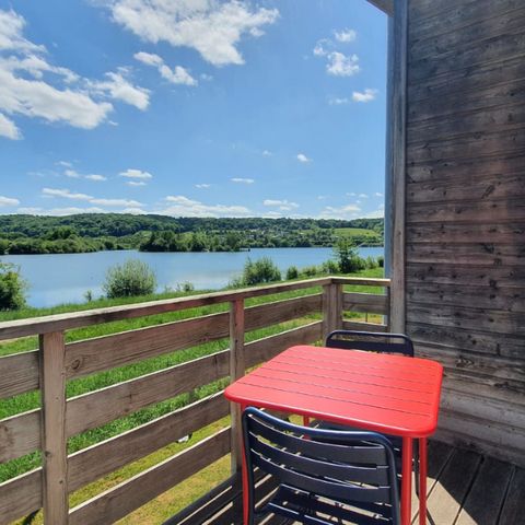 Hébergement 4 personnes - Cottage sur pilotis Privilège 35m² -1 chambre + 1 alcôve - lave vaisselle - terrasse face aux étangs