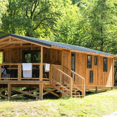 CHALET 5 personnes - Lodge VIP Premium 34m² - vue sur lac (2 chambres) + TV + draps + serviettes + terrasse couverte 11m² 4/5 pers.