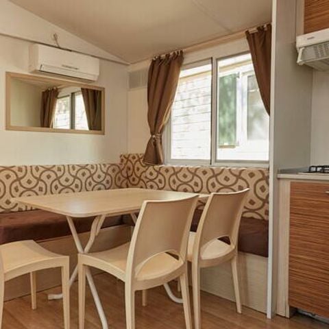 MOBILHOME 4 personnes - Mobil-home | Classic | 2 Ch. | 4 Pers. | Terrasse surélevée | 2 SDB | Clim. | TV