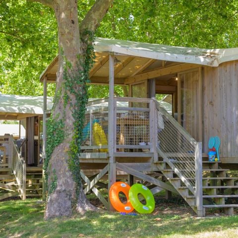 Safarizelt 4 Personen - Cabane Lodge Cosyflower PREMIUM 38m² (2 Zimmer) davon überdachte Terrasse 10m² + TV + Bettwäsche inklusive