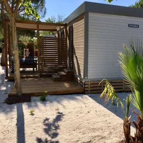 Mobilheim 4 Personen - Mobilheim ORANGER Premium 33m2 (2 Zimmer) überdachte Terrasse 19m2- 2 Bäder + LV + TV + Klimaanlage 1/5 Pers.