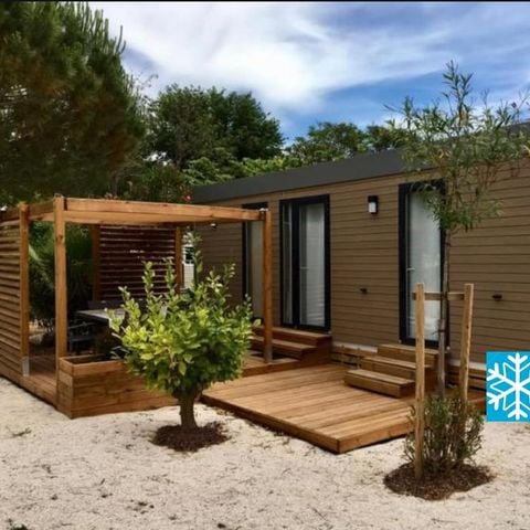 MOBILHOME 4 personnes - Mobil-home ORANGER Premium 33m2 (2 chambres) terrasse couverte 19m2- 2 SDB + LV + TV + Climatisation 1/5 pers
