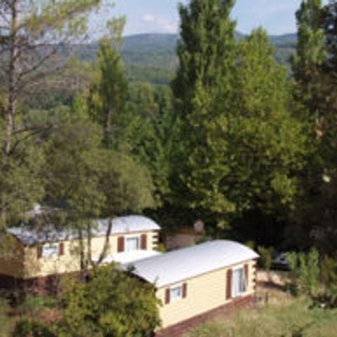 UNUSUAL ACCOMMODATION 4 people - Roulotte Confort 17 m² 1 bedroom - With bathroom + Outside arbour - without air conditioning 1/4 pers