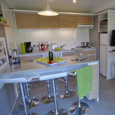 Mobilheim 6 Personen - Chalet Komfort Trapper 3 Zimmer, mit Mini-Holzchalet 2/P auf der Terrasse