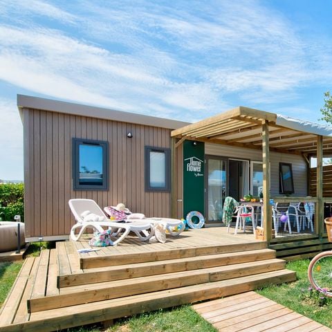 Stacaravan 4 personen - NIEUW// HomeFlower Premium 29m² - 2 kamers + Half overdekt terras + LV + TV + Bedlinnenpakket + Airconditioning -