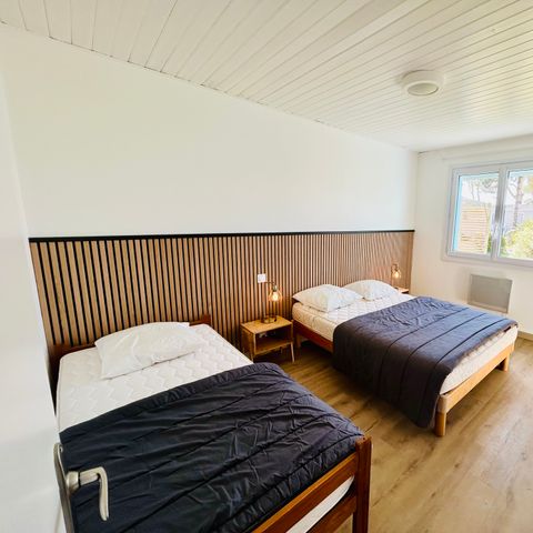 Villa 6 personas - 3 habitaciones - persona adicional posible con coste adicional, contactar con el camping