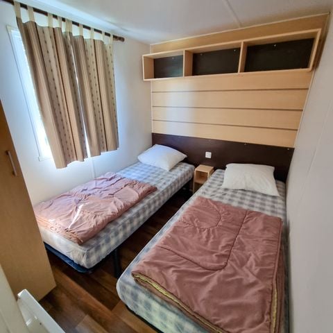 Stacaravan 4 personen - Stacaravan Standaard 30m² - 2 kamers + Terras 10m² + TV + Airco 4 pers