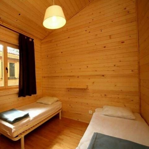 Chalet 4 personnes - Romarin - 2 chambres avec climatisation et TV