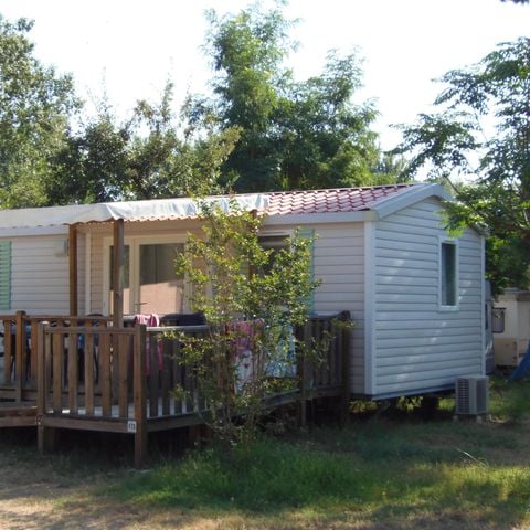 Stacaravan 4 personen - Stacaravan HELIOS met airconditioning PMR (Persoon met Beperkte Mobiliteit) 32m² + 15m² halfoverdekt terras