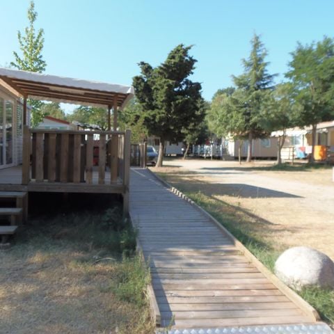 MOBILHOME 4 personnes - Mobilhome HELIOS climatisé PMR (Personne à Mobilité Réduite) 32m² + terrasse semi couverte 15m²