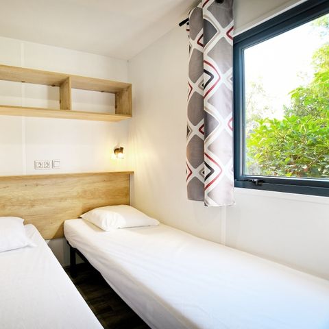 CASA MOBILE 4 persone - Santa-Giulia 32 m², aria condizionata, 2 camere da letto