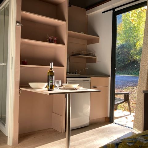 Chalet 1 person - Standard 10m² - Gemeinschaftsdusche und -WC + Überdachte Terrasse