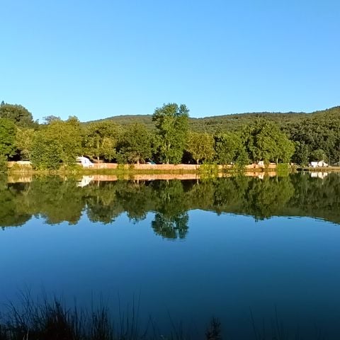 PLOT - 2 people, 1 tent, 1 vehicle