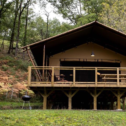 Tente en toile et en bois 6 personnes - Tente LODGE LUXE XL LUXE SAFARI 61m²  3 Chambres - Terrasse couverte