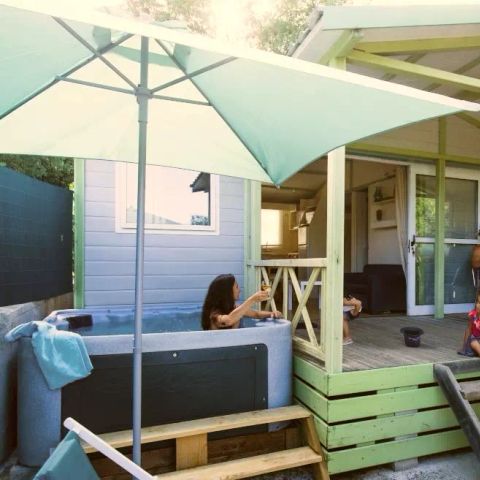 Chalet 6 personen - Grand Confort VIP 4 kamers 6 personen Airconditioning + TV + Jacuzzi