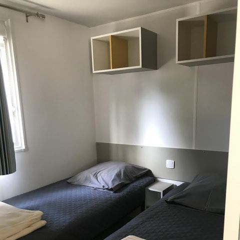 Mobile home 4 persons - 2 BEDROOM COMFORT mobile home 7.5mx4m (28-30m2) + semi-covered terrace + air conditioning + television