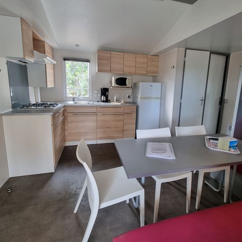 Mobile home 6 persons - 3 BEDROOM COMFORT mobile home 8.60m x 4m (34m²) + semi-covered terrace + air conditioning + television