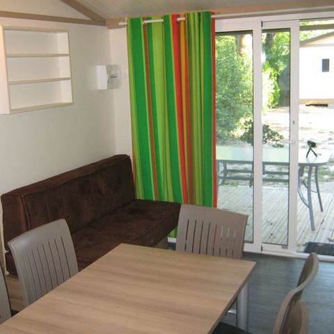 CHALET 6 people - Samoa Comfort Chalet, 46m² – 3 bedrooms, sleeps 4 adults and 2 children, with air conditioning and TV – semi-covered terrace, 19m², sleeps 1–6 people