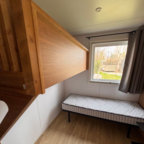 Mobilheim 4 Personen - NEW // Residenz LOUISIANE PMR Komfort 2 Zimmer + halbüberdachte Terrasse + TV