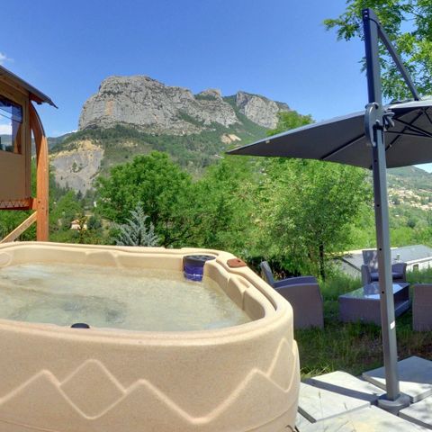 Safaritent 5 personen - Toilé Nature Luxe 32m² - Jacuzzi - 4 volwassenen + 1 kind