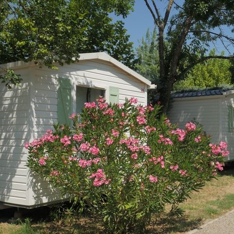 Mobilheim 4 Personen - 24m² Standard (2Sch - 4Pers.) + Strohhütte im Freien