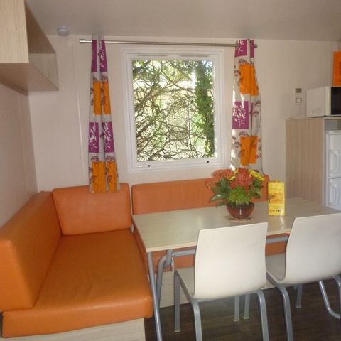 Mobilheim 4 Personen - 24m² Standard (2Sch - 4Pers.) + Strohhütte im Freien