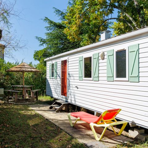 Mobilheim 4 personen - 24m² Standard (2Sch - 4Pers.) + Strohhütte im Freien