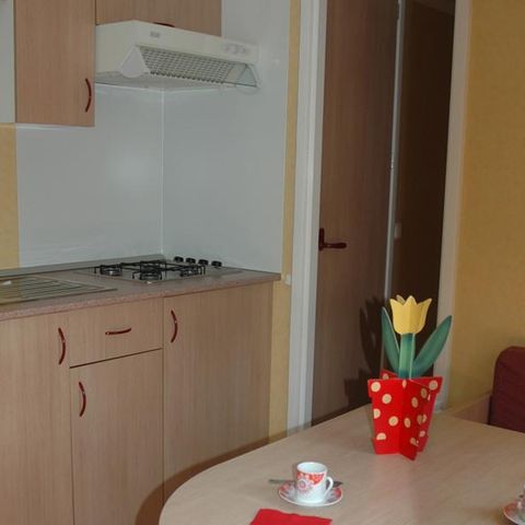 Mobilheim 4 Personen - M54 - 26m² mit halbüberdachter Terrasse / 2 Schlafzimmer